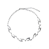 Irregular Shaped Metal Necklace On The Street - Zambeel